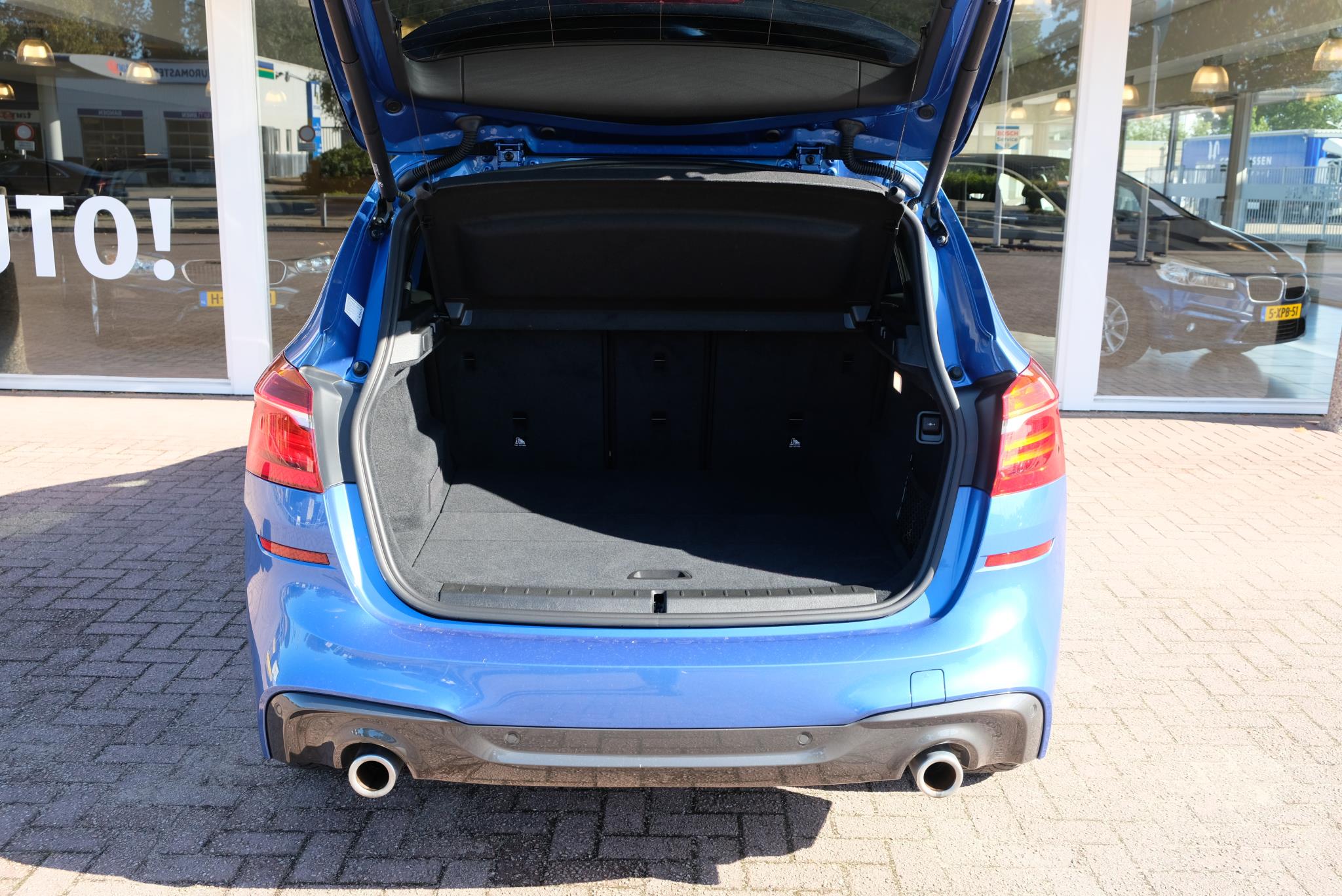 BMW 2 Serie 220i 192pk Aut. Active Tourer M Sport | Navi | Full LED | Panoramadak | Head-up Display | Camera | Climate afbeelding 27