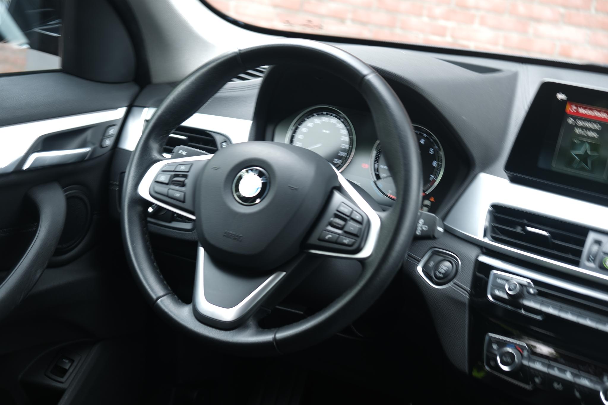 BMW X1 sDrive18i 140pk Aut. High Executive | Navi | Climate | Leder | Head-up Display | Elektrische Achterklep | Stoelverwarming | PDC afbeelding 9