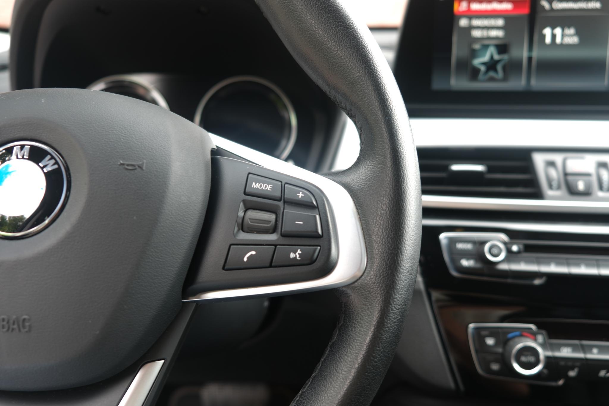 BMW X1 sDrive18i 140pk Aut. High Executive | Navi | Climate | Leder | Head-up Display | Elektrische Achterklep | Stoelverwarming | PDC afbeelding 12