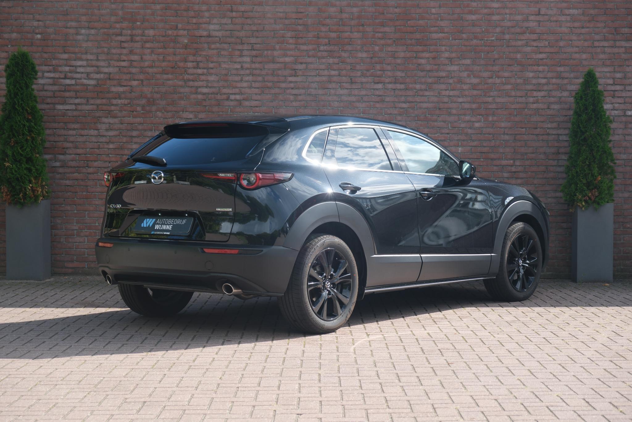 Mazda CX-30 2.5 e-SkyActiv-G M Hybrid 140pk Aut. Homura | Navi | App Connect | Climate | Adaptive Cruise | Head-Up Display | Camera | Keyless | Elektrische Achterklep afbeelding 23