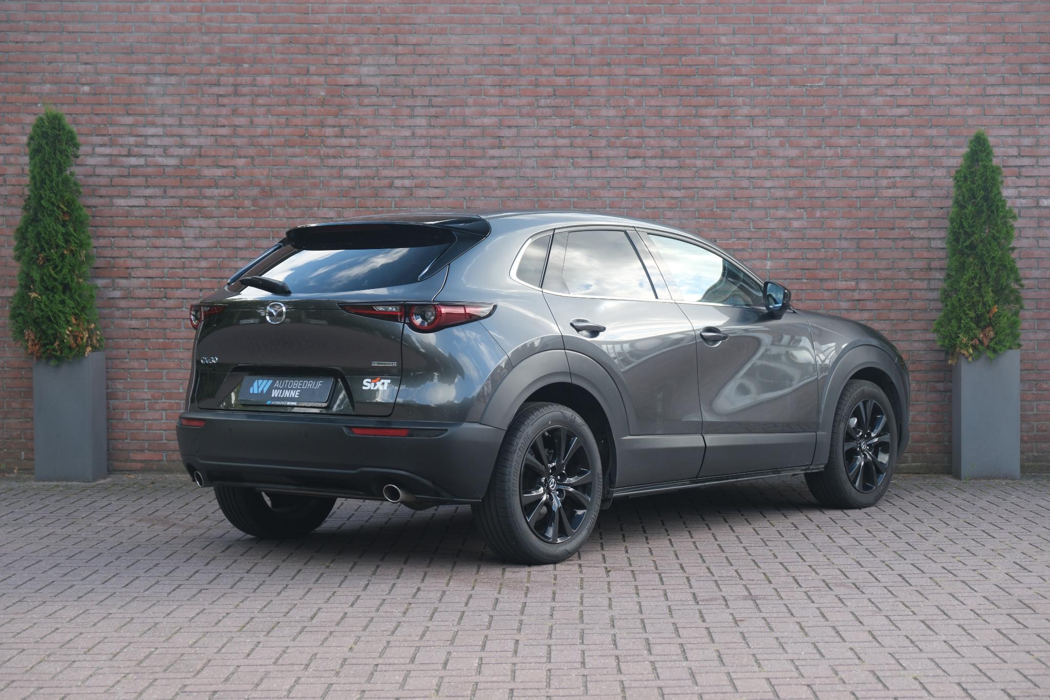Mazda CX-30 2.5 e-SkyActiv-G M Hybrid 140pk Aut. Homura | Navi | App Connect | Climate | Adaptive Cruise | Head-Up Display | Camera | Keyless | Elektrische Achterklep afbeelding 25