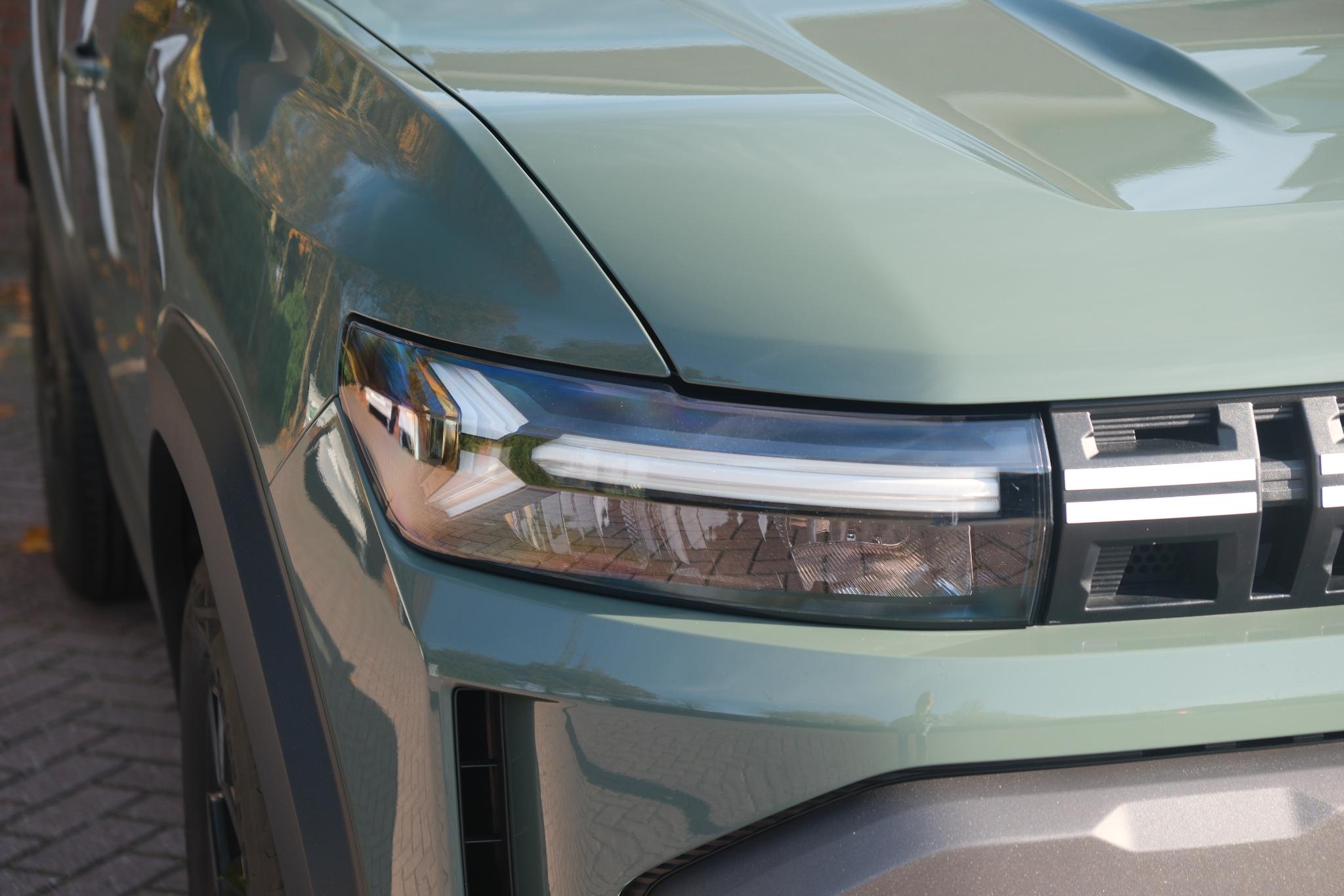 Dacia Duster 1.2 TCe 130pk mild hybrid Extreme | App Connect | Climate | Cruise | Keyless | Camera | PDC afbeelding 2