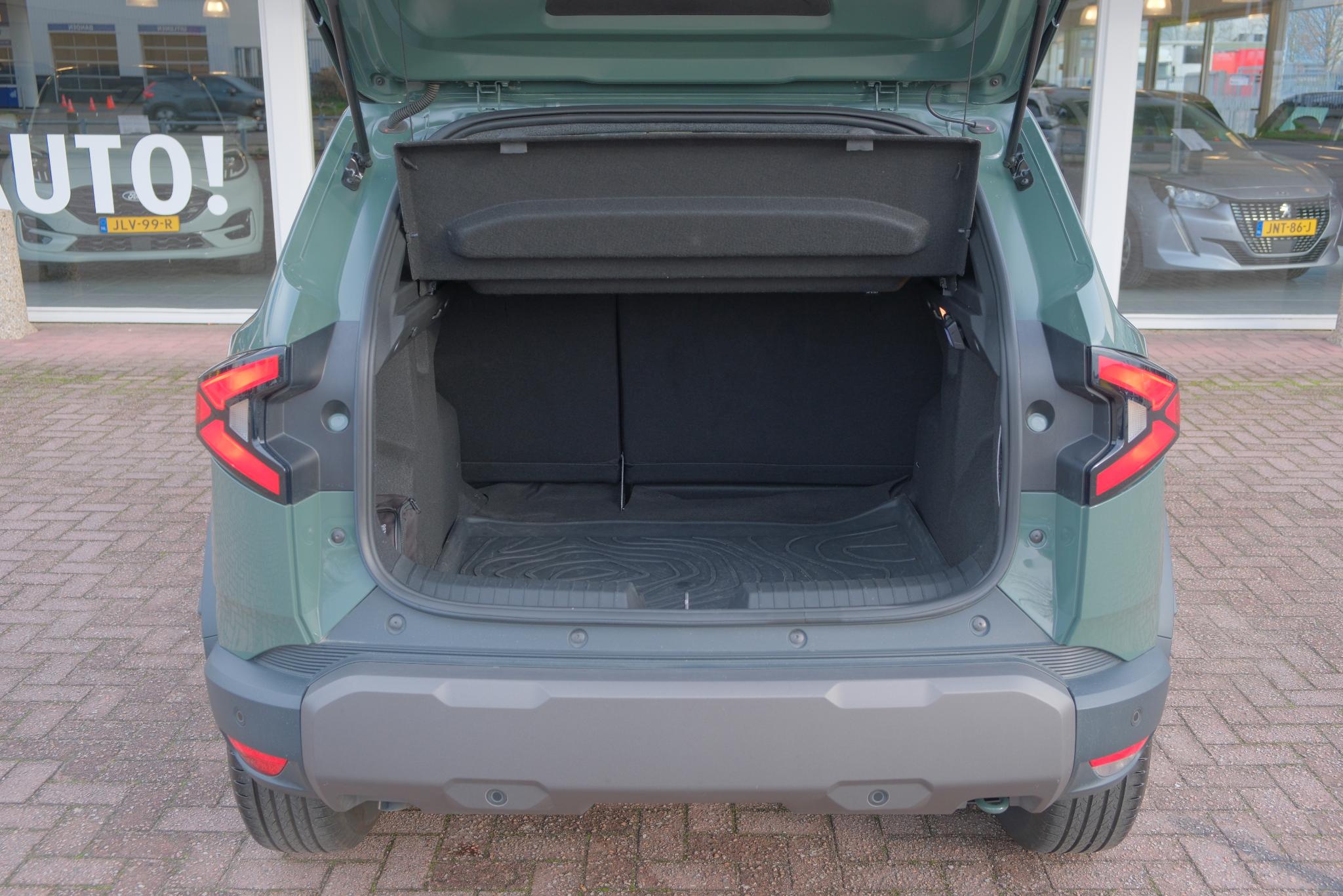 Dacia Duster 1.2 TCe 130pk mild hybrid Extreme | App Connect | Climate | Cruise | Keyless | Camera | PDC afbeelding 22