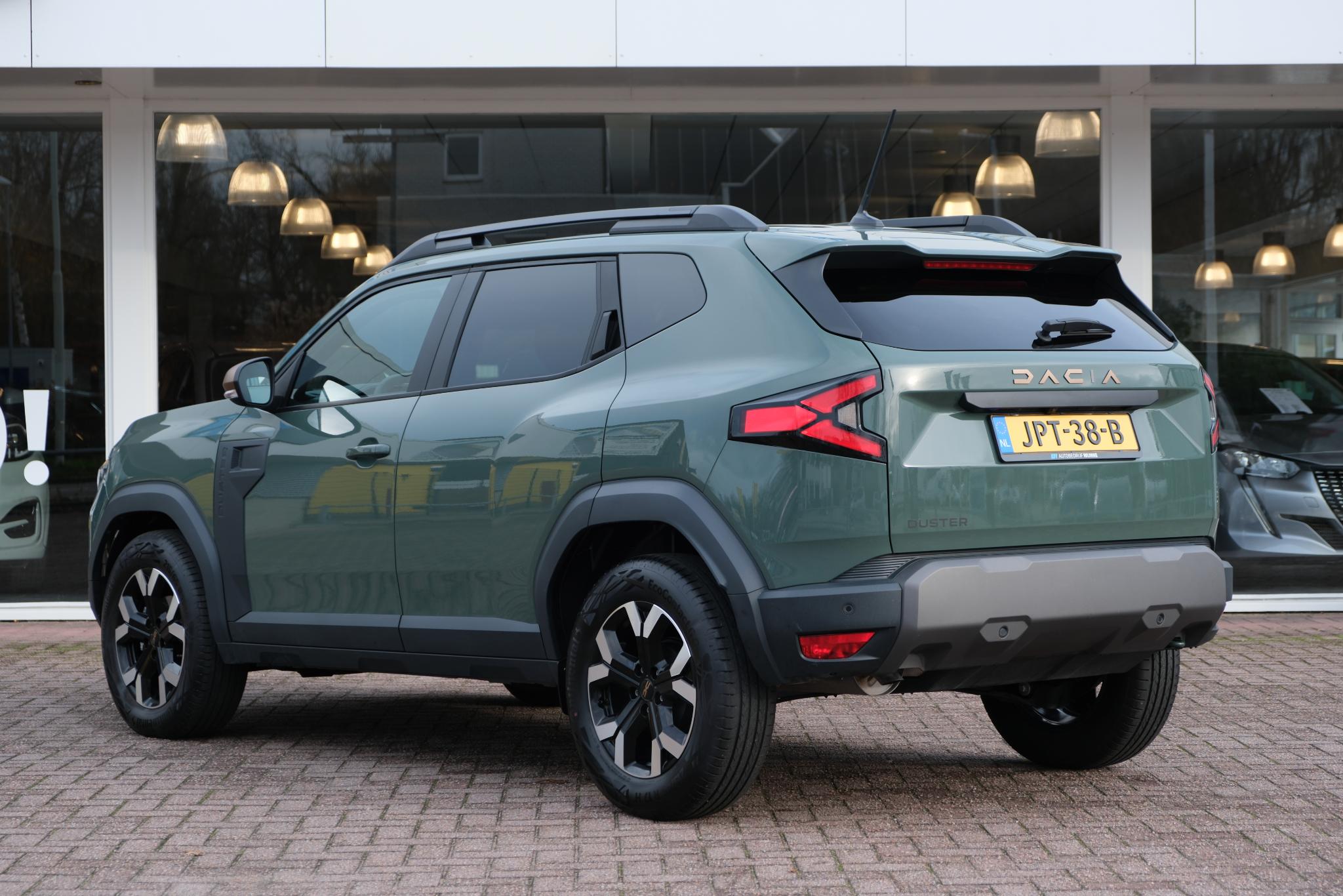 Dacia Duster 1.2 TCe 130pk mild hybrid Extreme | App Connect | Climate | Cruise | Keyless | Camera | PDC afbeelding 24