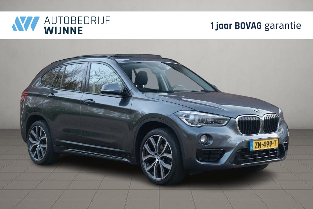 BMW X1 sDrive18i 140pk Aut. High Executive | Navi | Climate | Panoramadak | Head-up Display | Elektrische Achterklep | Stoelverwarming | PDC | Trekhaak afbeelding 1