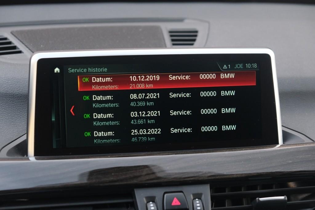 BMW X1 sDrive18i 140pk Aut. High Executive | Navi | Climate | Panoramadak | Head-up Display | Elektrische Achterklep | Stoelverwarming | PDC | Trekhaak afbeelding 20