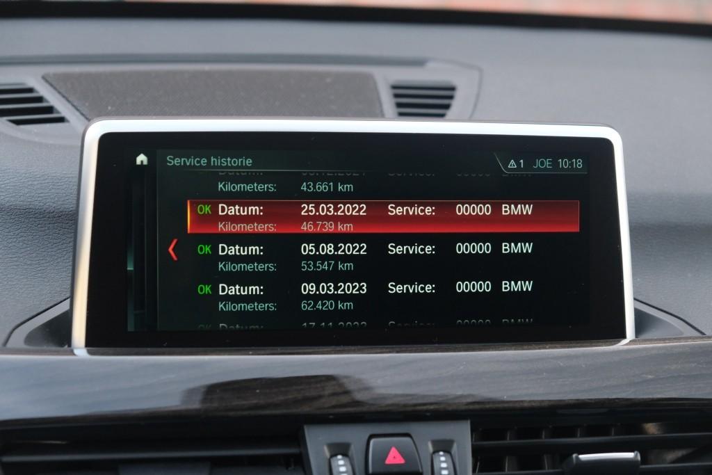 BMW X1 sDrive18i 140pk Aut. High Executive | Navi | Climate | Panoramadak | Head-up Display | Elektrische Achterklep | Stoelverwarming | PDC | Trekhaak afbeelding 21