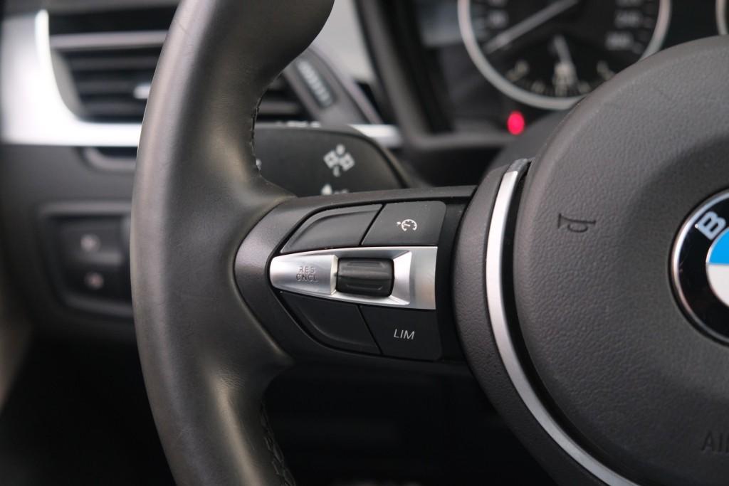 BMW X1 sDrive20i 192pk Aut. High Executive | M Sport | Navi | Climate | Panoramadak | Head-up Display | Elektrische Achterklep | Stoelverwarming | PDC | Trekhaak afbeelding 9