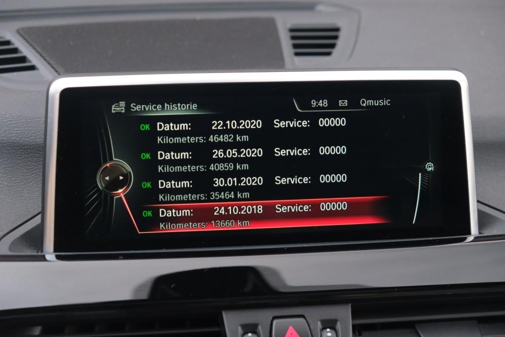 BMW X1 sDrive20i 192pk Aut. High Executive | M Sport | Navi | Climate | Panoramadak | Head-up Display | Elektrische Achterklep | Stoelverwarming | PDC | Trekhaak afbeelding 21