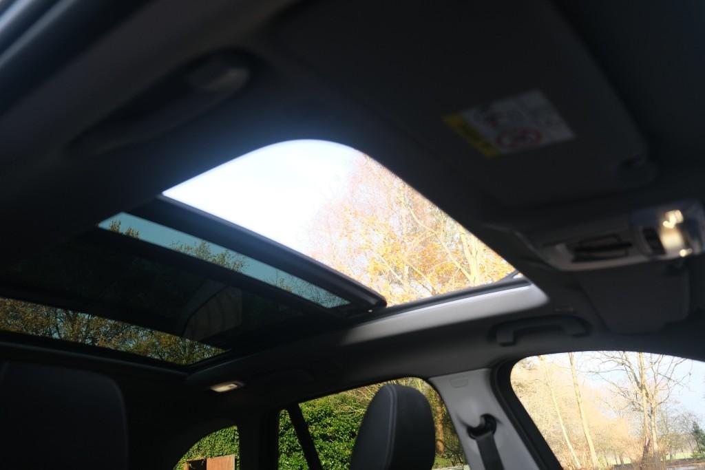 BMW X1 sDrive18i 140pk Aut. High Executive | Navi | Climate | Panoramadak | Head-up Display | Elektrische Achterklep | Stoelverwarming | PDC | Trekhaak afbeelding 13