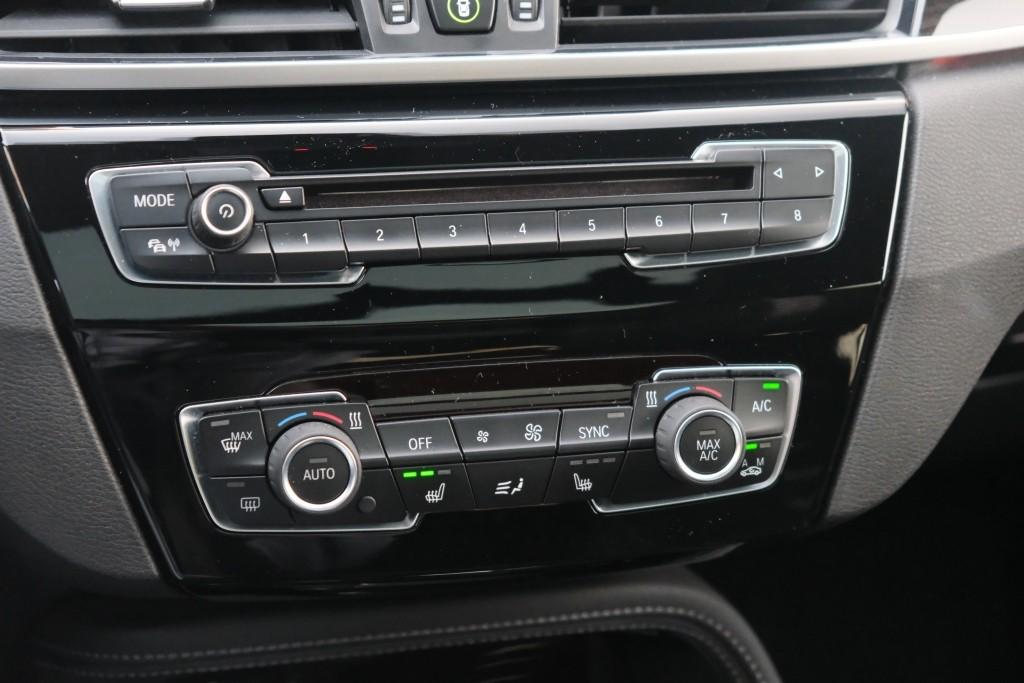 BMW X1 sDrive18i 140pk Aut. High Executive | Navi | Climate | Panoramadak | Head-up Display | Elektrische Achterklep | Stoelverwarming | PDC | Trekhaak afbeelding 22