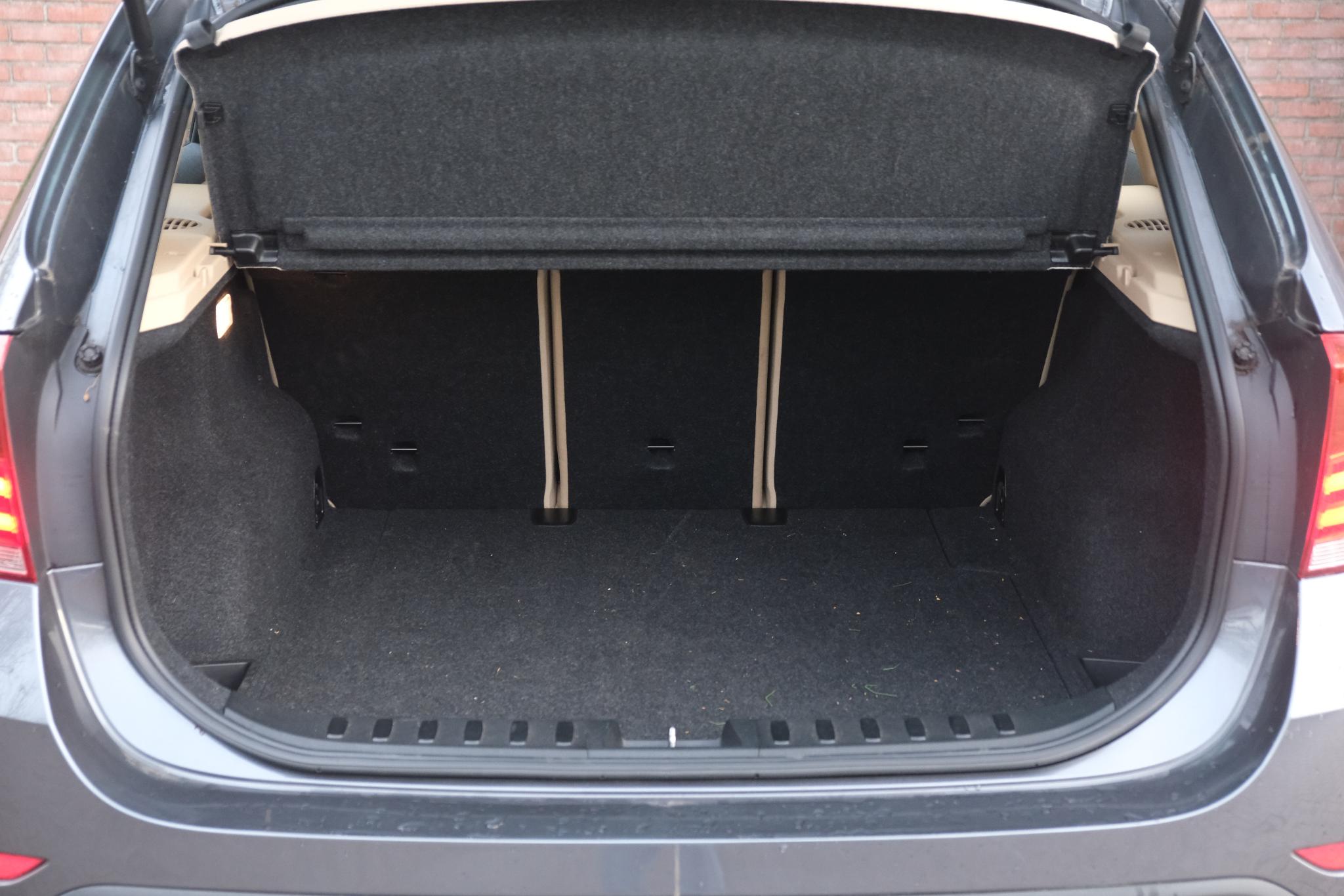 BMW X1 xDrive20i 184pk Aut. High Executive | Navi | Climate | Cruise | Xenon | Stoelverwarming | Leder | PDC afbeelding 34