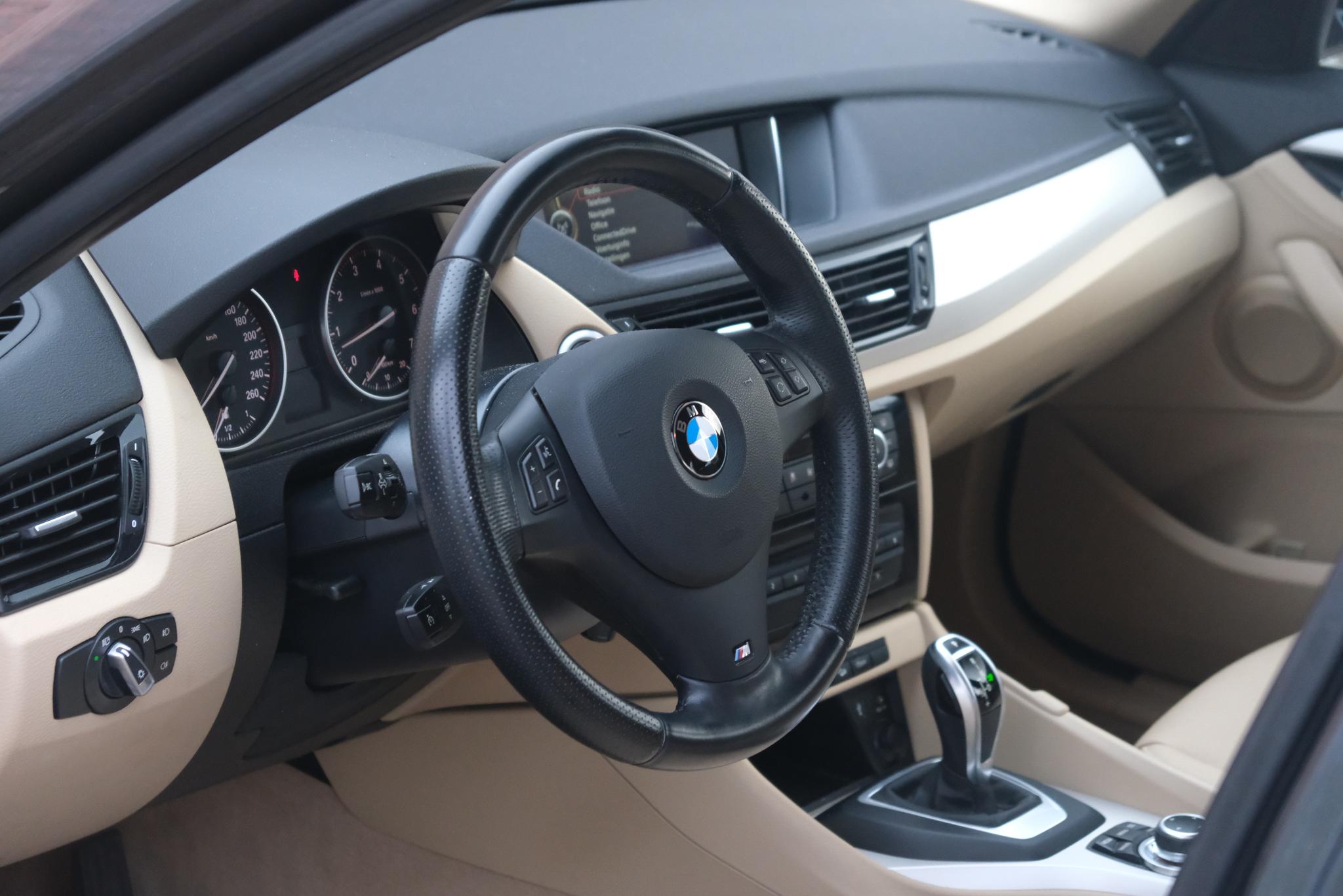 BMW X1 xDrive20i 184pk Aut. High Executive | Navi | Climate | Cruise | Xenon | Stoelverwarming | Leder | PDC afbeelding 9