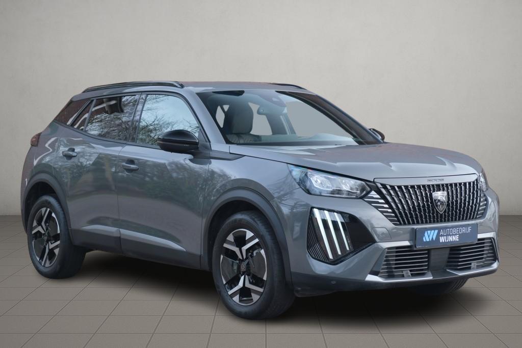 Peugeot 2008 1.2 PureTech 100pk Allure | Navi | App Connect | Climate | Adaptive Cruise | Keyless | Camera | Blind Spot afbeelding 1