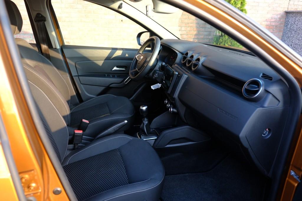 Dacia Duster 1.6 SCe 114pk Prestige | App Connect | Airco | Cruise | Camera | Stoelverwarming | PDC | Trekhaak afbeelding 3