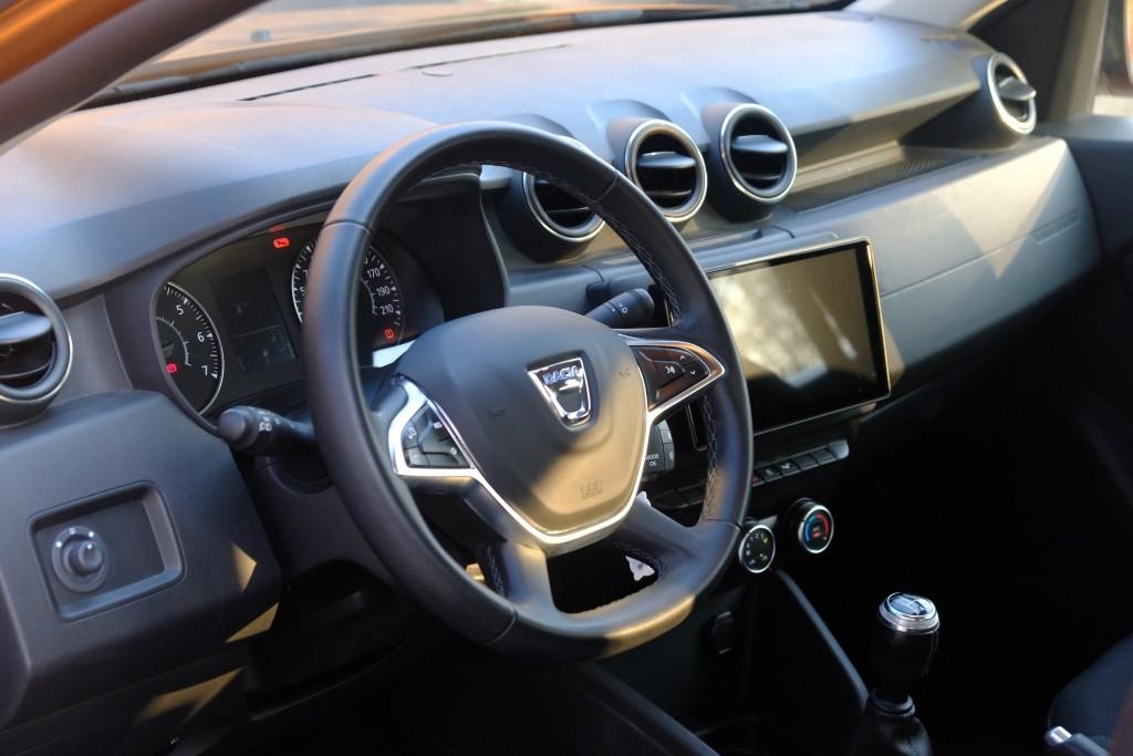 Dacia Duster 1.6 SCe 114pk Prestige | App Connect | Airco | Cruise | Camera | Stoelverwarming | PDC | Trekhaak afbeelding 7