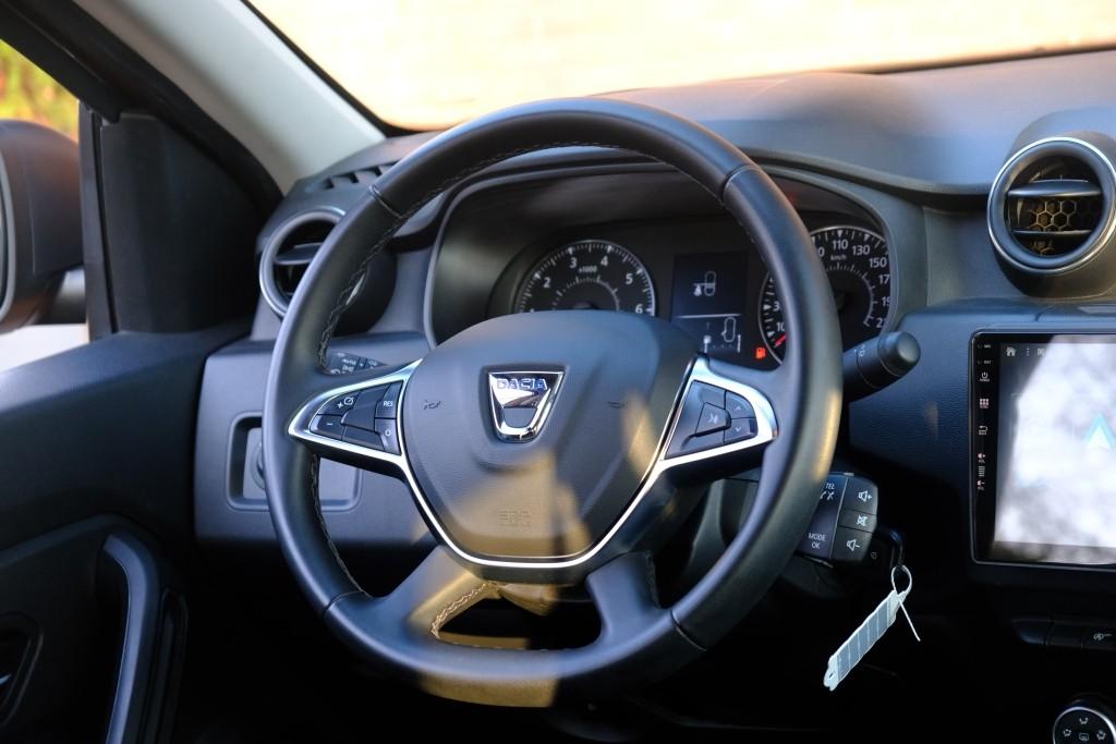 Dacia Duster 1.6 SCe 114pk Prestige | App Connect | Airco | Cruise | Camera | Stoelverwarming | PDC | Trekhaak afbeelding 11