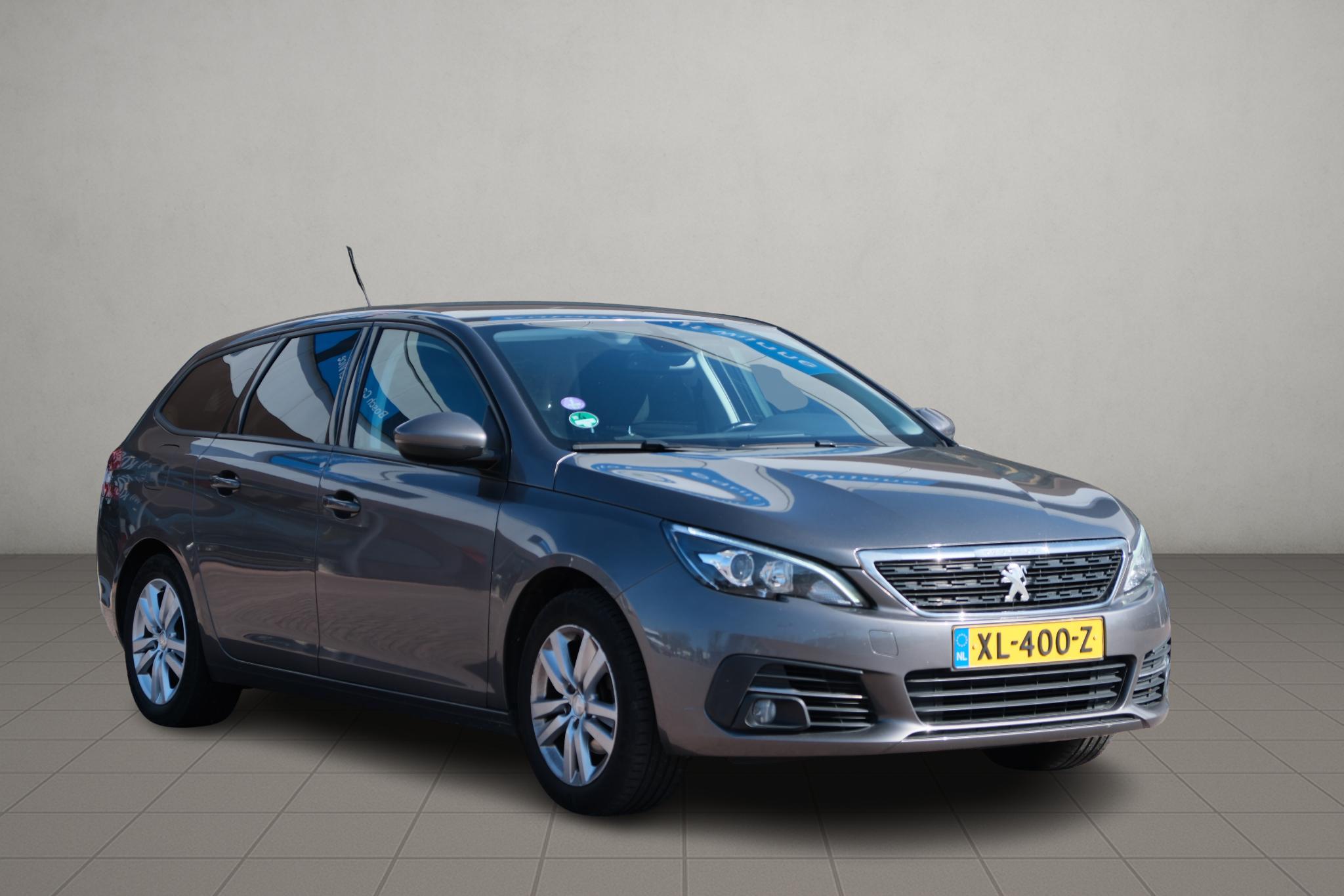 Peugeot 308 SW 1.2 PureTech 130pk Allure | Navi | Cruise | Trekhaak | Climate | PDC afbeelding 1