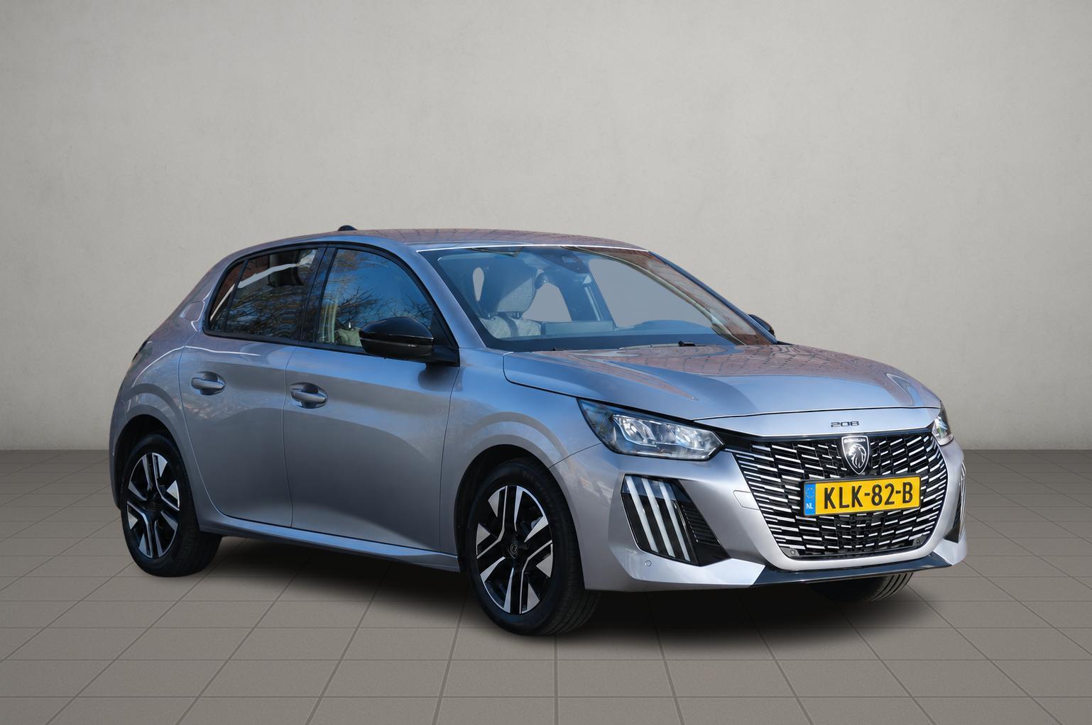 Peugeot 208 1.2 PureTech 100pk Allure | Navi | App Connect | Climate | Cruise | Camera | Dodehoek | PDC afbeelding 1