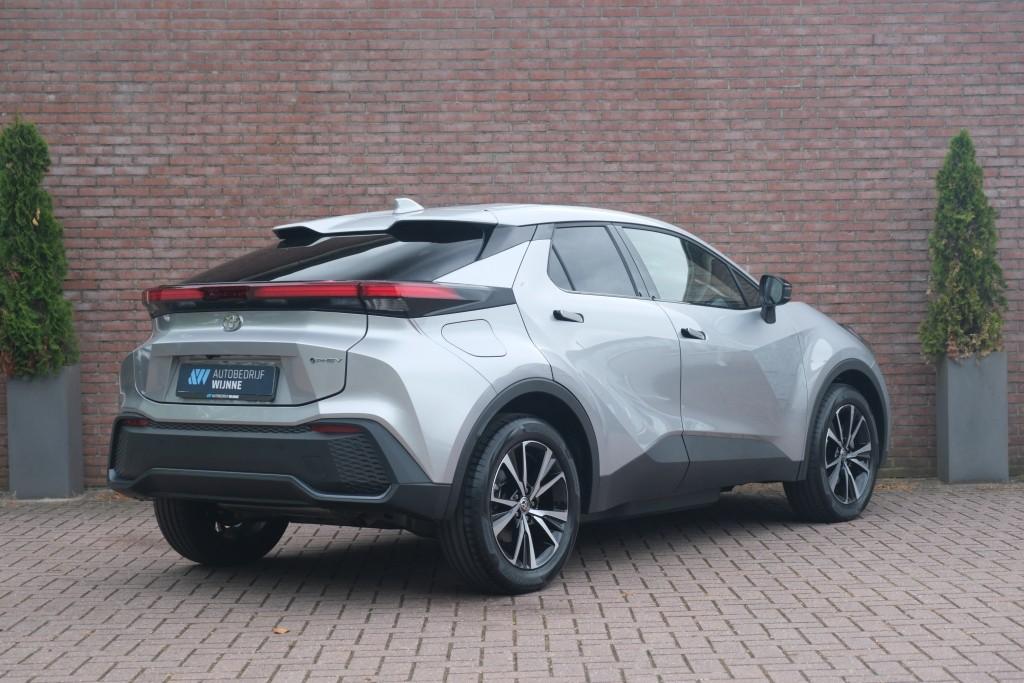 Toyota C-HR 2.0 Plug-in Hybrid 220pk Dynamic | Navi | App Connect | Climate | Adaptive Cruise | Camera | Keyless | Dodehoek | Winter Pakket afbeelding 31