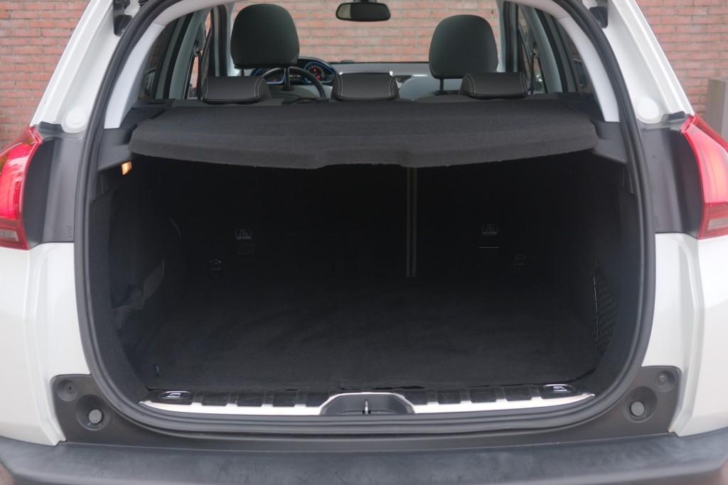 Peugeot 2008 1.2 PureTech 130pk Blue Lease Allure | Navi | App Connect | Climate | Cruise | Camera | Panoramadak afbeelding 32