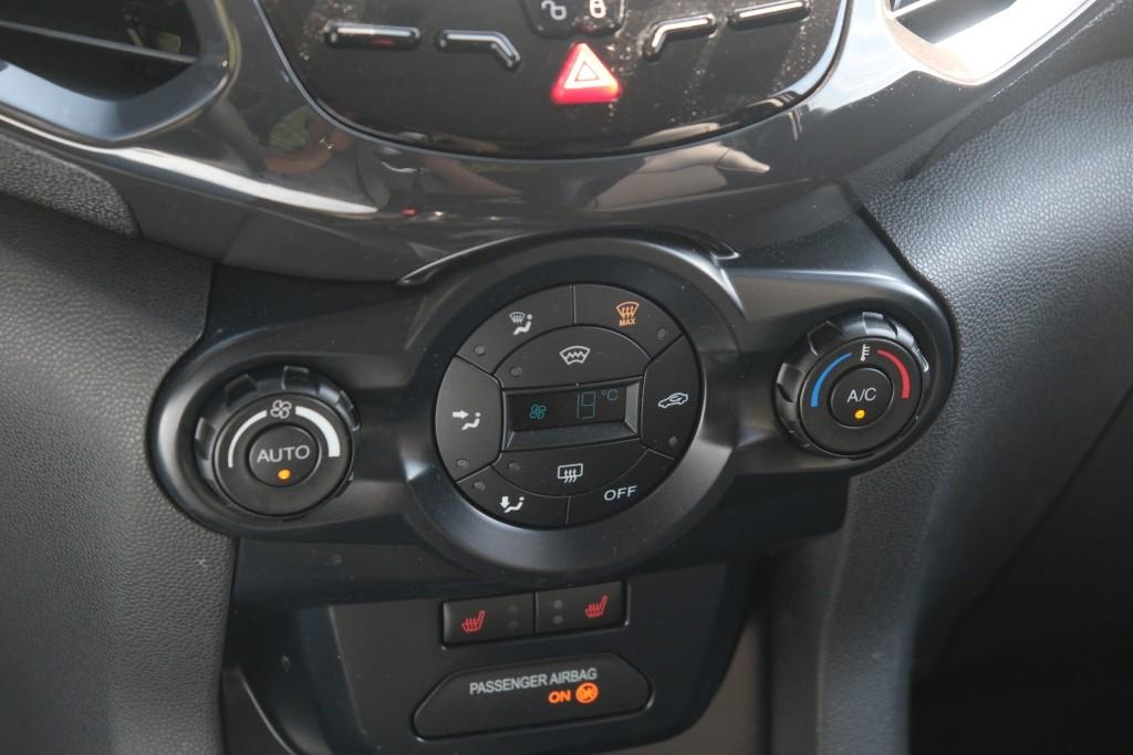 Ford EcoSport 1.0 EcoBoost 125pk Titanium S | Navi | Climate | Cruise | Keyless | Camera | Winter Pakket | Trekhaak afbeelding 22