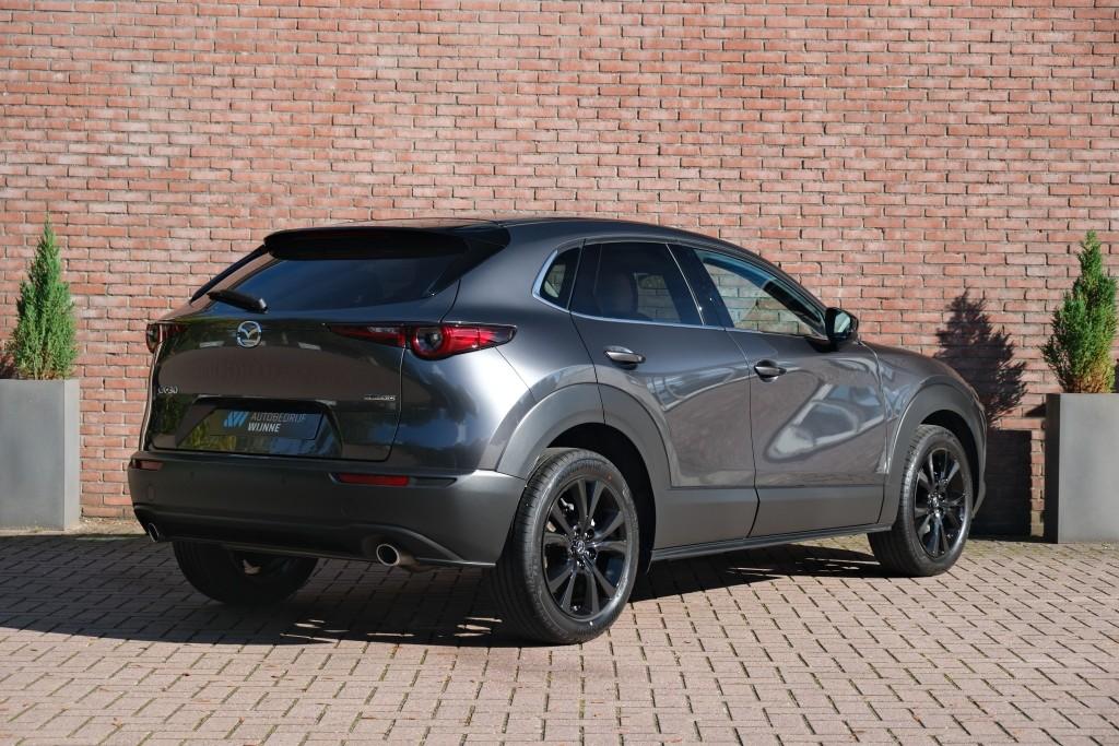Mazda CX-30 2.5 e-SkyActiv-G M Hybrid 140pk Aut. Nagisa - Head-up display - Bose - Adaptieve cruise - Achteruitrijcamera - Dodehoekdetectie - Stoelverwarming - Elektrische achterklep - Keyless afbeelding 32