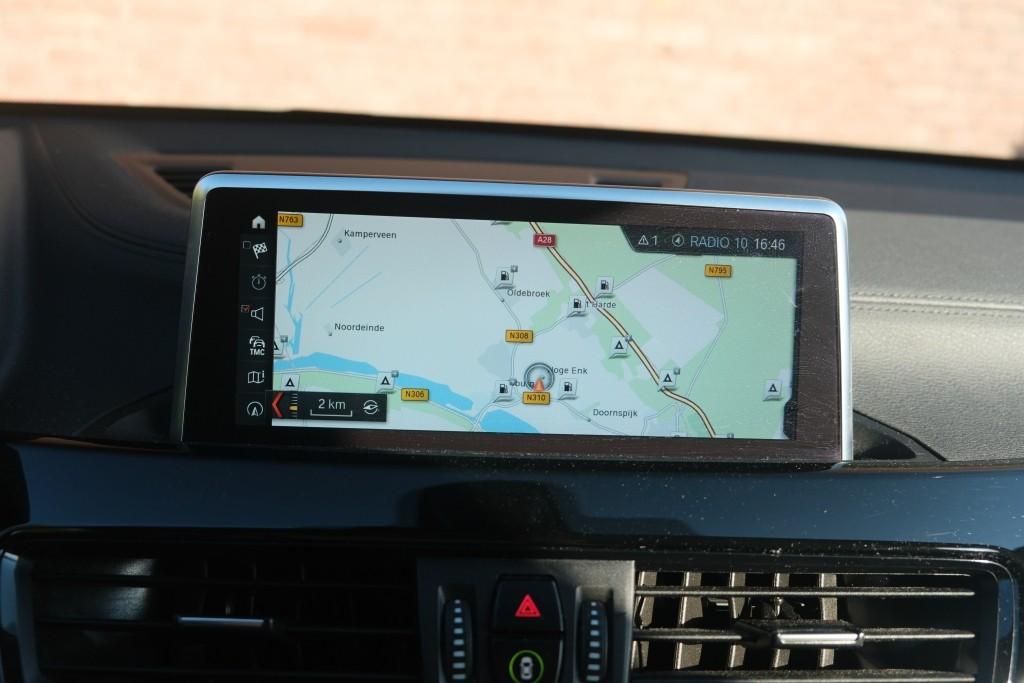 BMW X1 sDrive18i 140pk Aut. Executive Edition - Navigatiesysteem - Achteruitrijcamera - Cruise control - Climate control - Stoelverwarming - Apple CarPlay - Elektrische achterklep - Parkeersensoren afbeelding 15