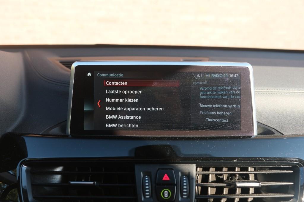 BMW X1 sDrive18i 140pk Aut. Executive Edition - Navigatiesysteem - Achteruitrijcamera - Cruise control - Climate control - Stoelverwarming - Apple CarPlay - Elektrische achterklep - Parkeersensoren afbeelding 17